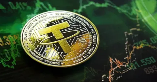 Tether превращает золото в кешбэк: детали новой карты Visa